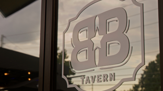 Restaurant logo on glass door